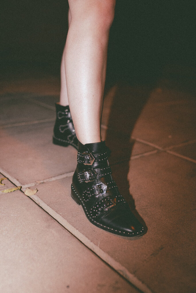 A closeup of Trina's studded Givenchy boots